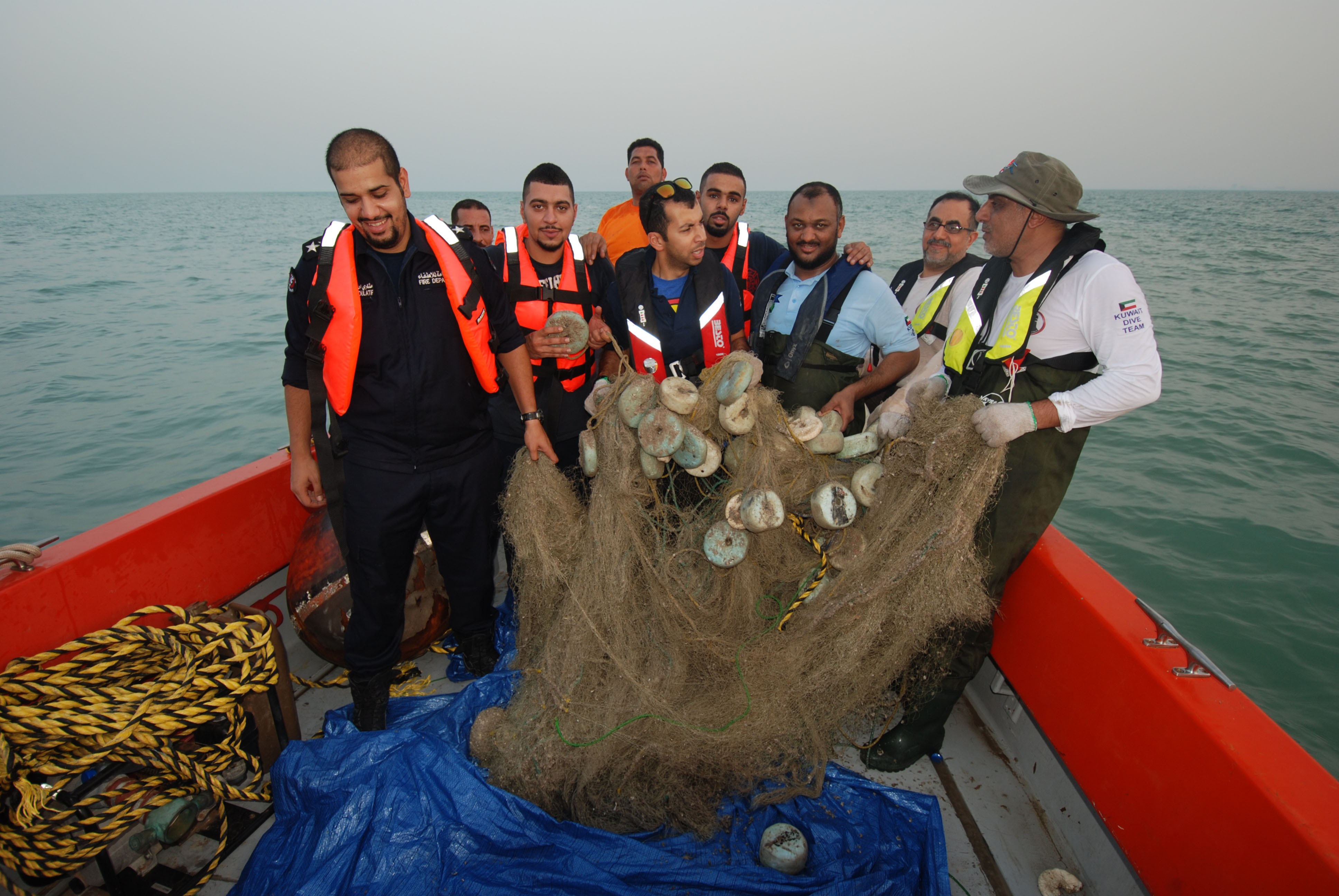 Members of Kuwait diving team and (KFSD) marine rescue center after