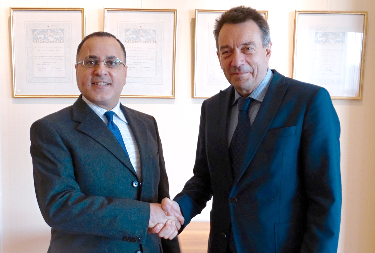 Kuwait permanent representative to UN and International Organizations in Geneva Jamal Al-Ghunaim with ICRC's President Peter Maurer