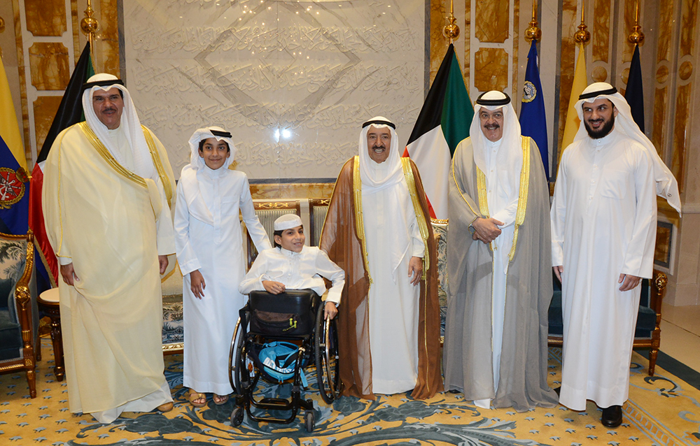 His Highness the Amir Sheikh Sabah Al-Ahmad Al-Jaber Al-Sabah receives  two Qatari boys Ghanim Mohammad Al-Muftah and Ahmad Mohammad Al-Muftah and Ghanim Around-the-World Tour team