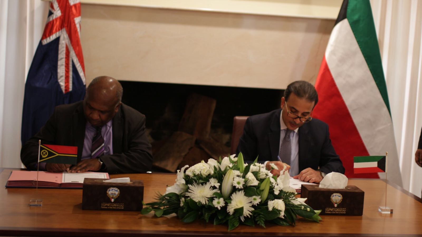 Ambassador Australia Najeeb Al-Bader signs the agreements for establishing "Kuwait Vocational Training Friendship Centre" and a project named "Kuwait Classrooms" for primary education