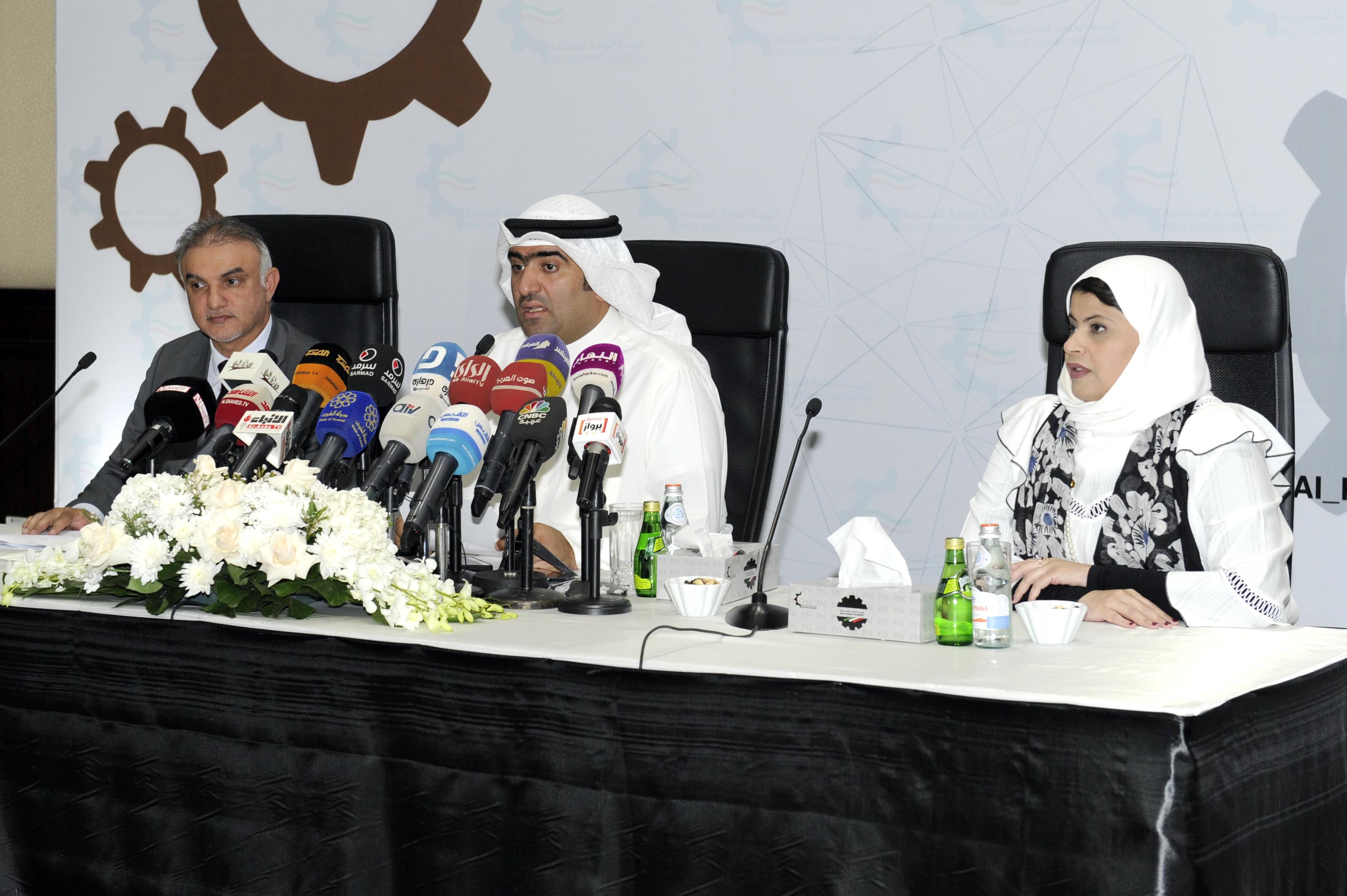 Minister of Commerce and Industry Khaled Al-Roudhan and PAI's General Director Abdulkarim Taqi in the press conference