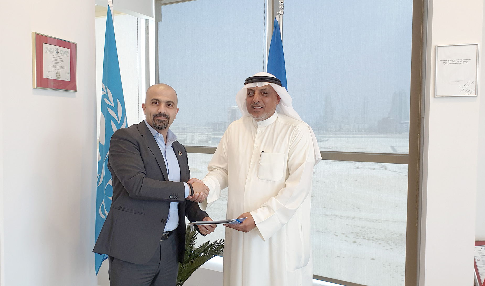 Head of the UNEP's bureau Sami Dimassi with Head of the diving team at the EVF Waleed Al-Fadhel