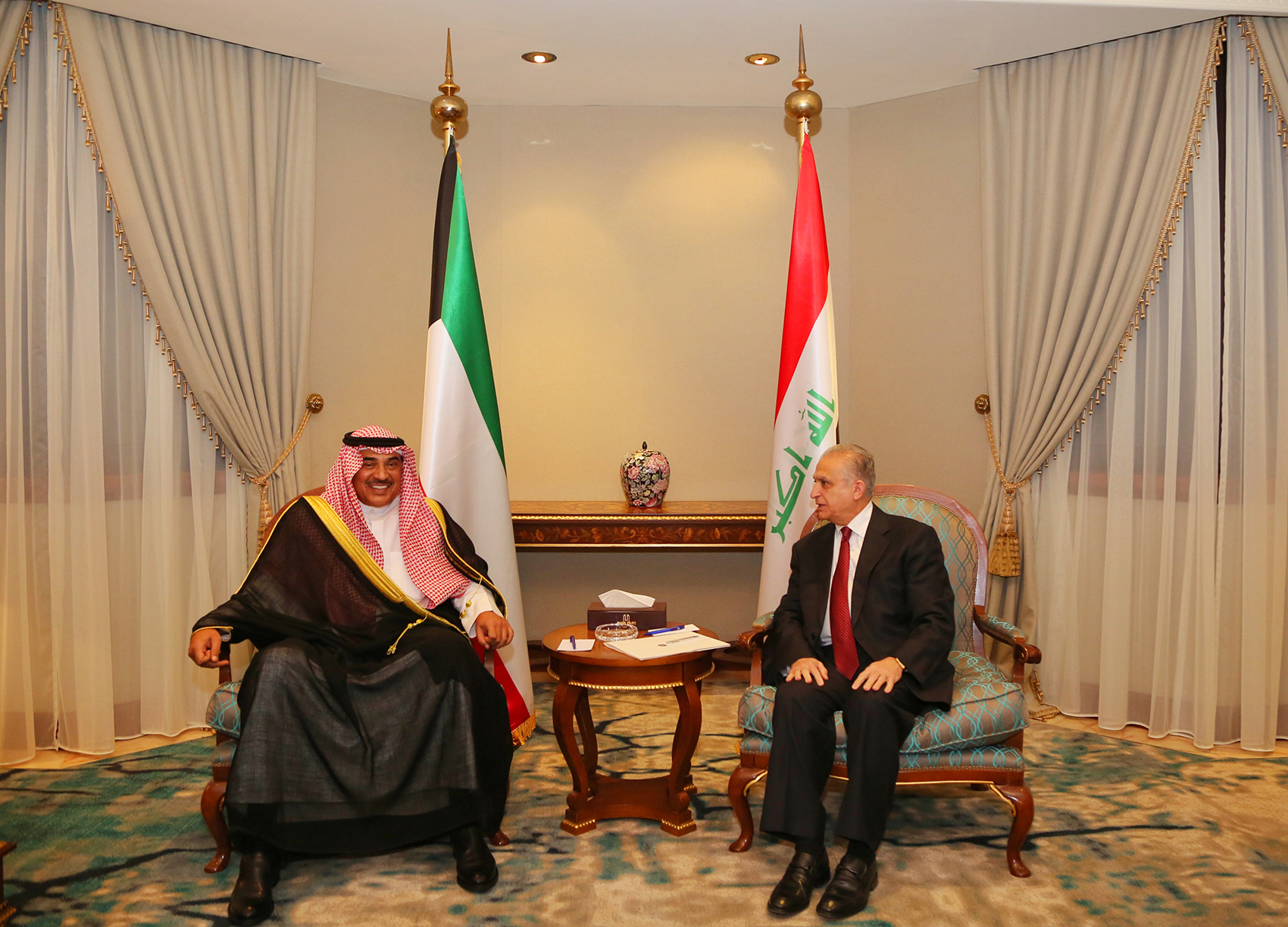 Kuwaiti Deputy Prime Minister and Foreign Minister Sheikh Sabah Al-Khaled Al-Hamad Al-Sabah with Foreign Minister Mohammad Al-Hakim