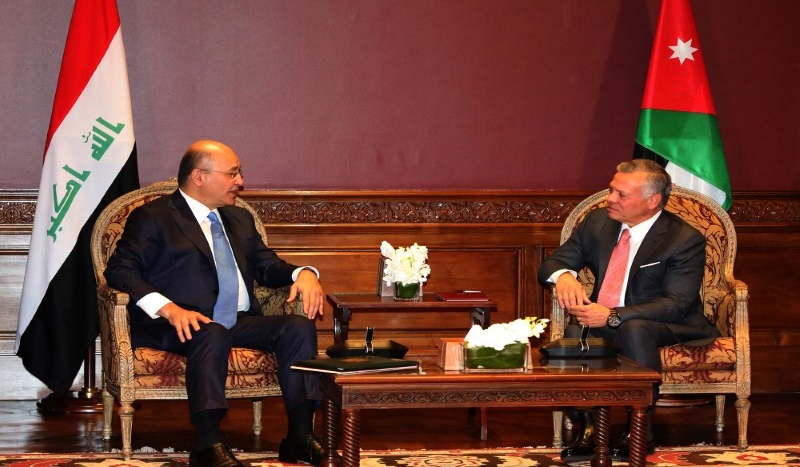 العاهل الاردني الملك عبدالله الثاني والرئيس العراقي برهم صالح خلال مباحثات جرت في العاصمة الأردنية