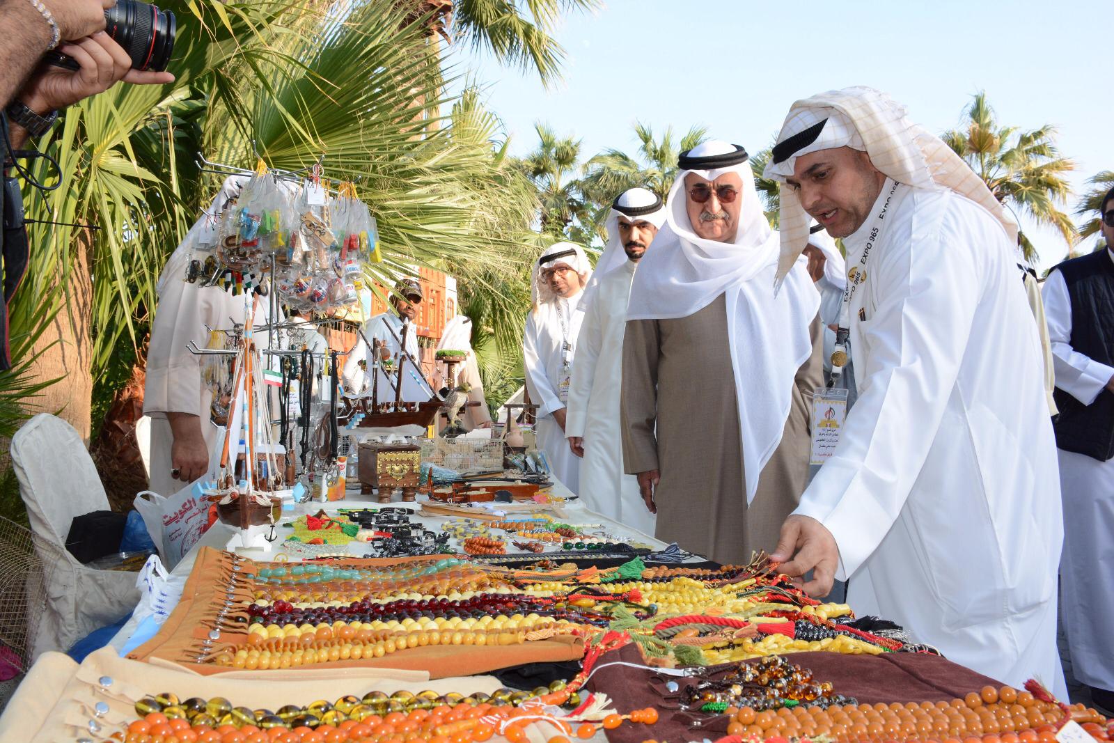Director-General of the (PAAF) Mohammad Al-Sabah opens the second day of a local traditional exhibition
