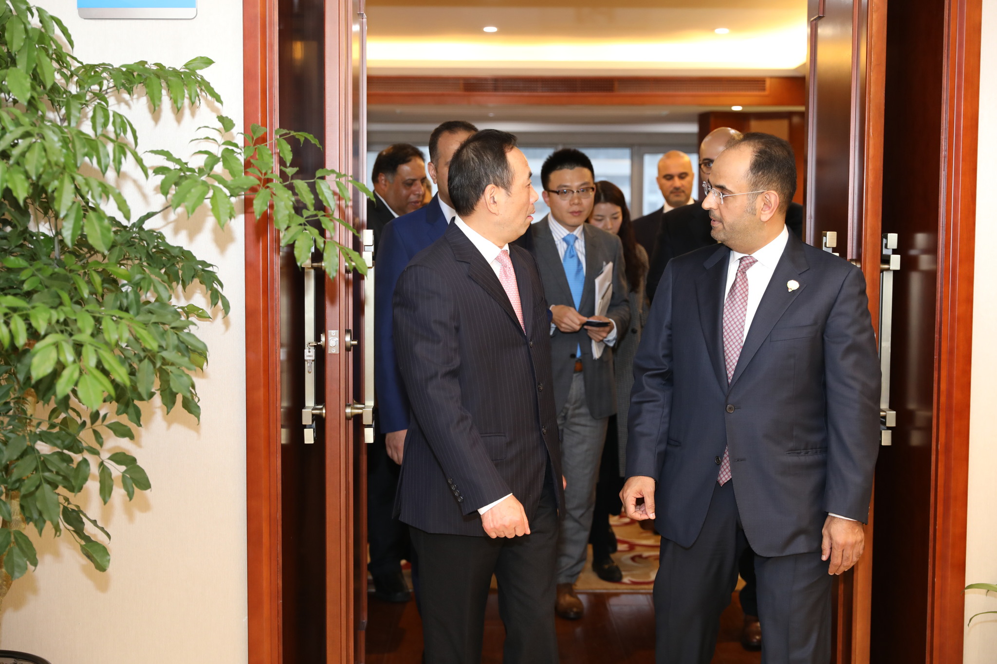 Kuwait's Finance Minister Dr. Nayef Al-Hajraf with Chinese official