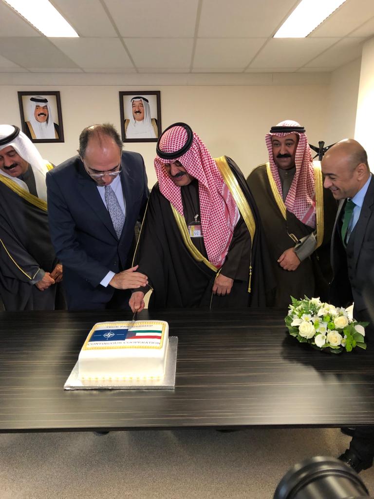 Cutting the cake at the opening ceremony of Kuwait office in NATO.
