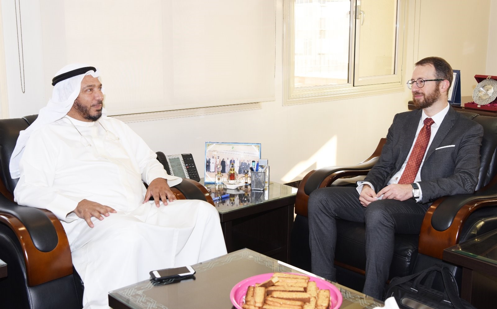 Chairman of Kuwait's (IICO) and Amiri Diwan advisor Dr. Abdullah Al-Matouq meets with Chief of the UNRWA Donor Relations Division, Marc Lassouaoui