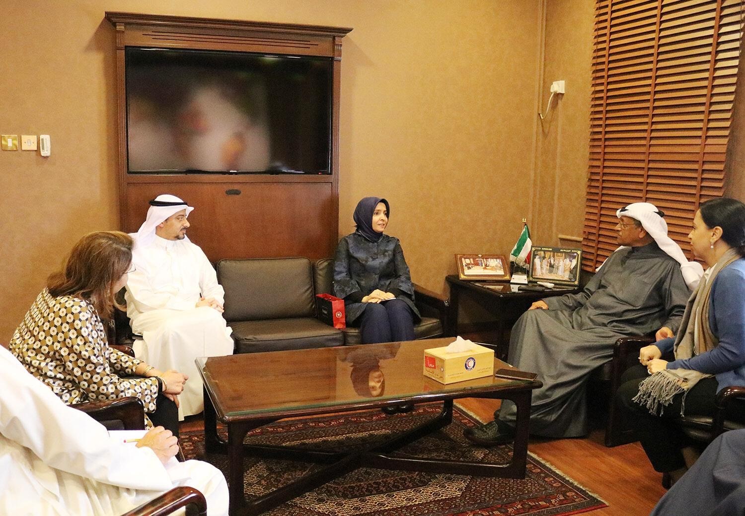 Turkish Ambassador to Kuwait Ayse Koytak meets with Kuwait Red Crescent Society (KRCS) Deputy Chairman Anwar Al-Hasawi,