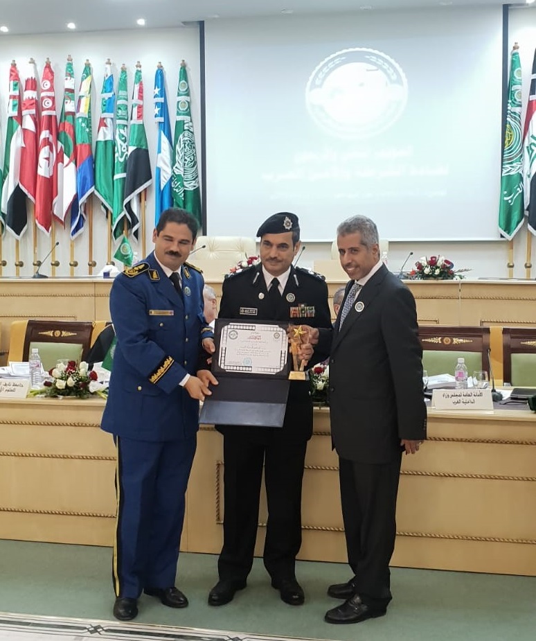 The assistant undersecretary at the MoI, Major General Faraj Al-Zu'bi receives the award for the "best film on traffic safety"