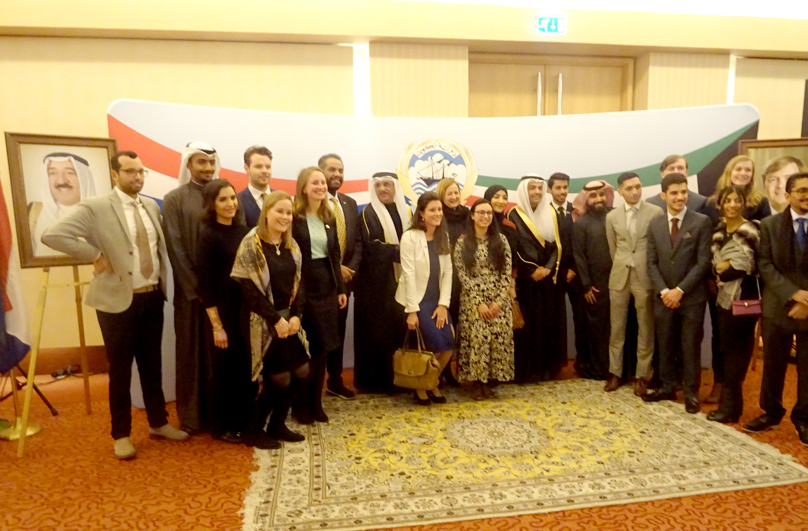 Secretary-General of the Dutch Foreign Ministry, Mrs. Yoka Brandt, and Kuwait's ambassador to the Netherlands Shamlan Al Roomi  in a group photo with Kuwaiti and Dutch students