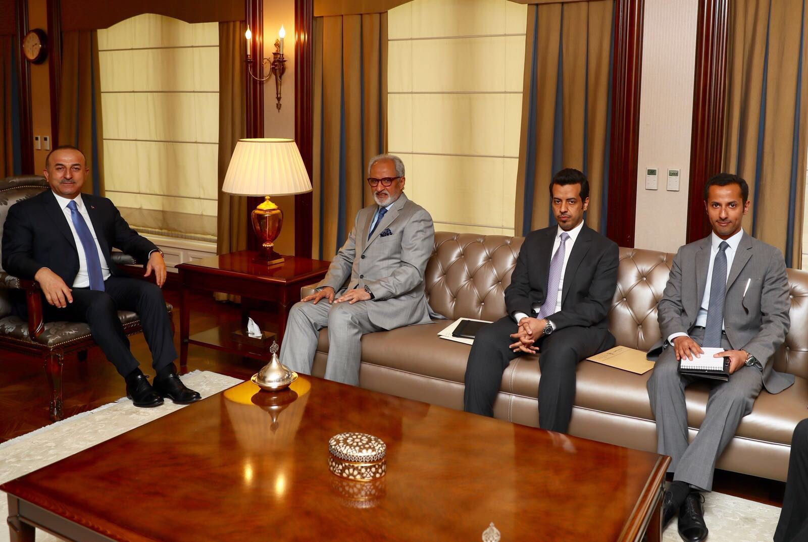 Turkish Minister of Foreign Affairs, Mevlut Cavusoglu meets Kuwait's Ambassador to Turkey Ghassan Al-Zawawi
