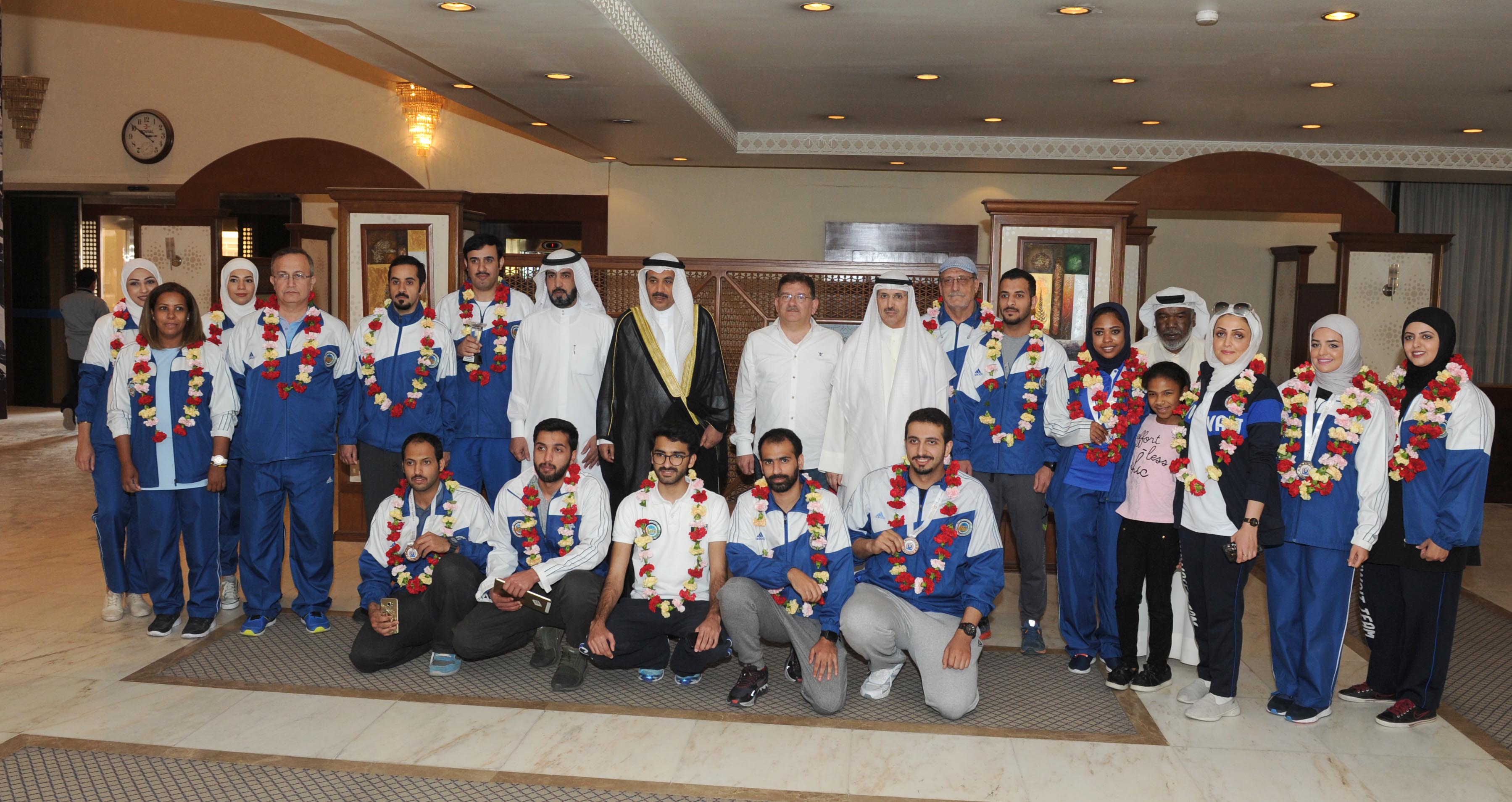 استقبال الوفد الكويتي المشارك في البطولة العربية للرماية لدى وصوله للبلاد