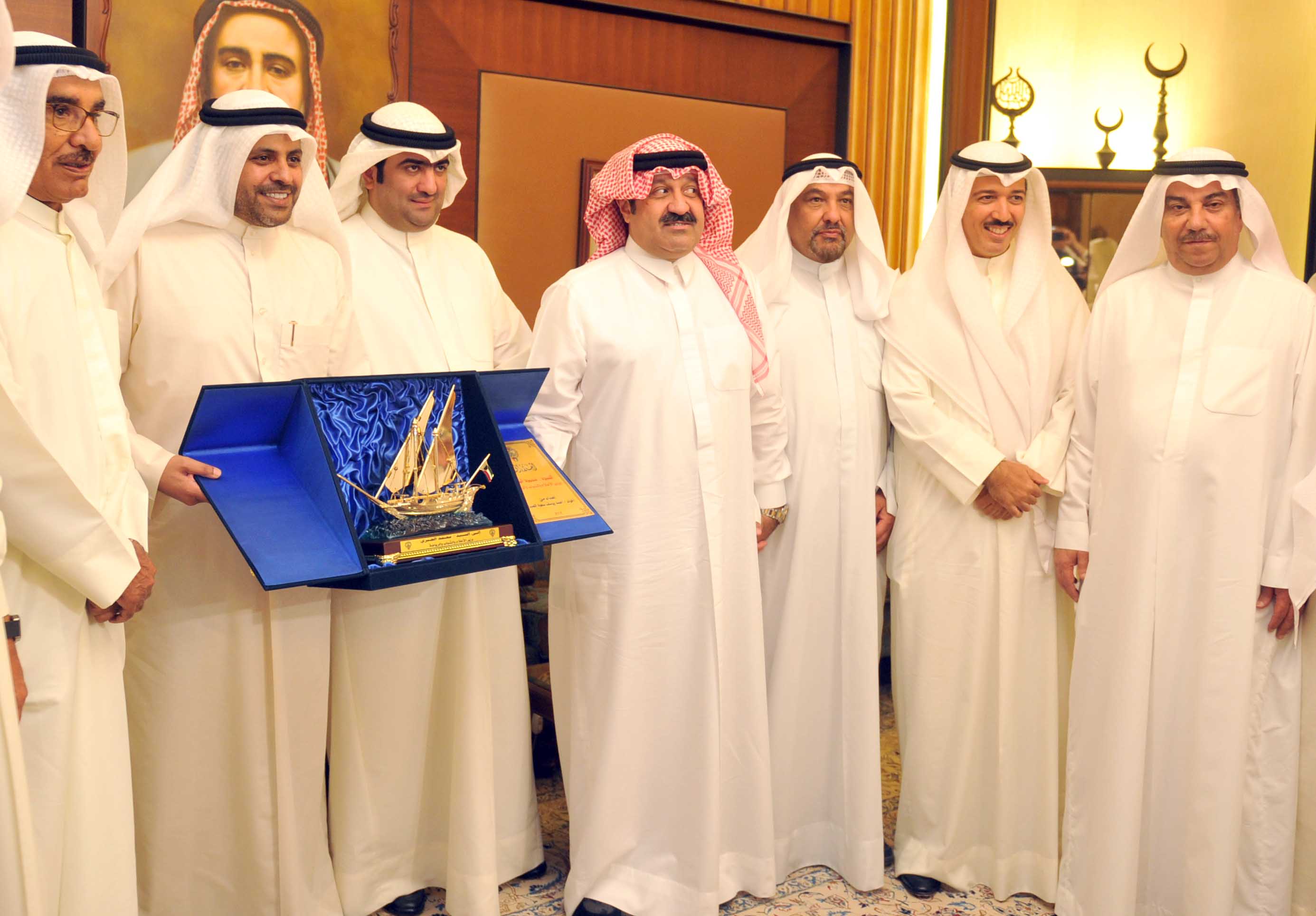 Minister of Information and Minister of State for Youth Affairs Mohammad Al-Jabri at a ceremony, honoring Minister of Commerce and Industry Khaled Al-Roudhan