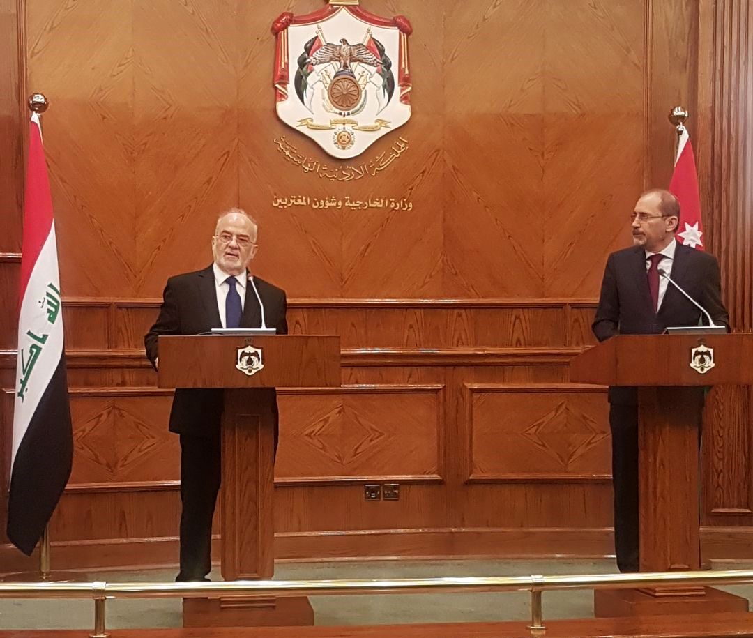 Jordanian counterpart Ayman Al-Safadi during the joint press conference with Iraqi counterpart Ibrahim Al-Jaafari