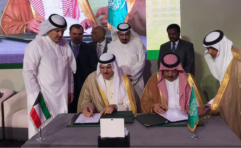 Head of Kuwait's Directorate General of Civil Aviation (DGCA) Sheikh Salman Al-Humoud Al-Sabah and Saudi General Authority of Civil Aviation (GACA) Abdul-Hakim Al-Tamimi sign the agreement