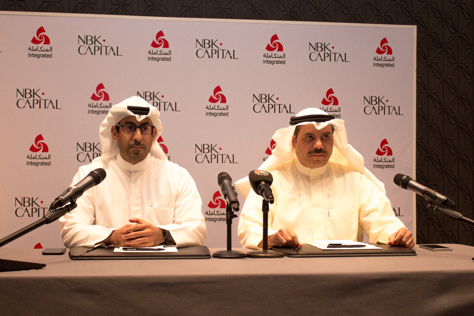 NBK Capital's CEO, Faisal Al-Hamad and Mustafa Boodai, Chairman and CEO of IHC during press conference