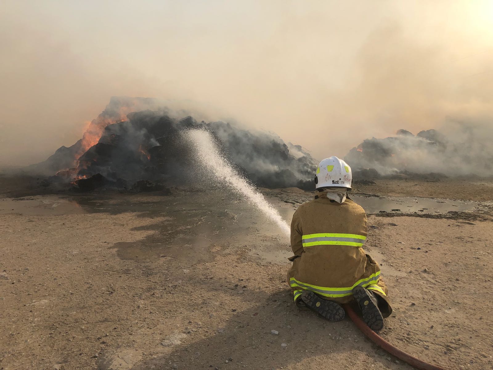 Kuwait Fire Service Directorate (KFSD) teams fighting the fire