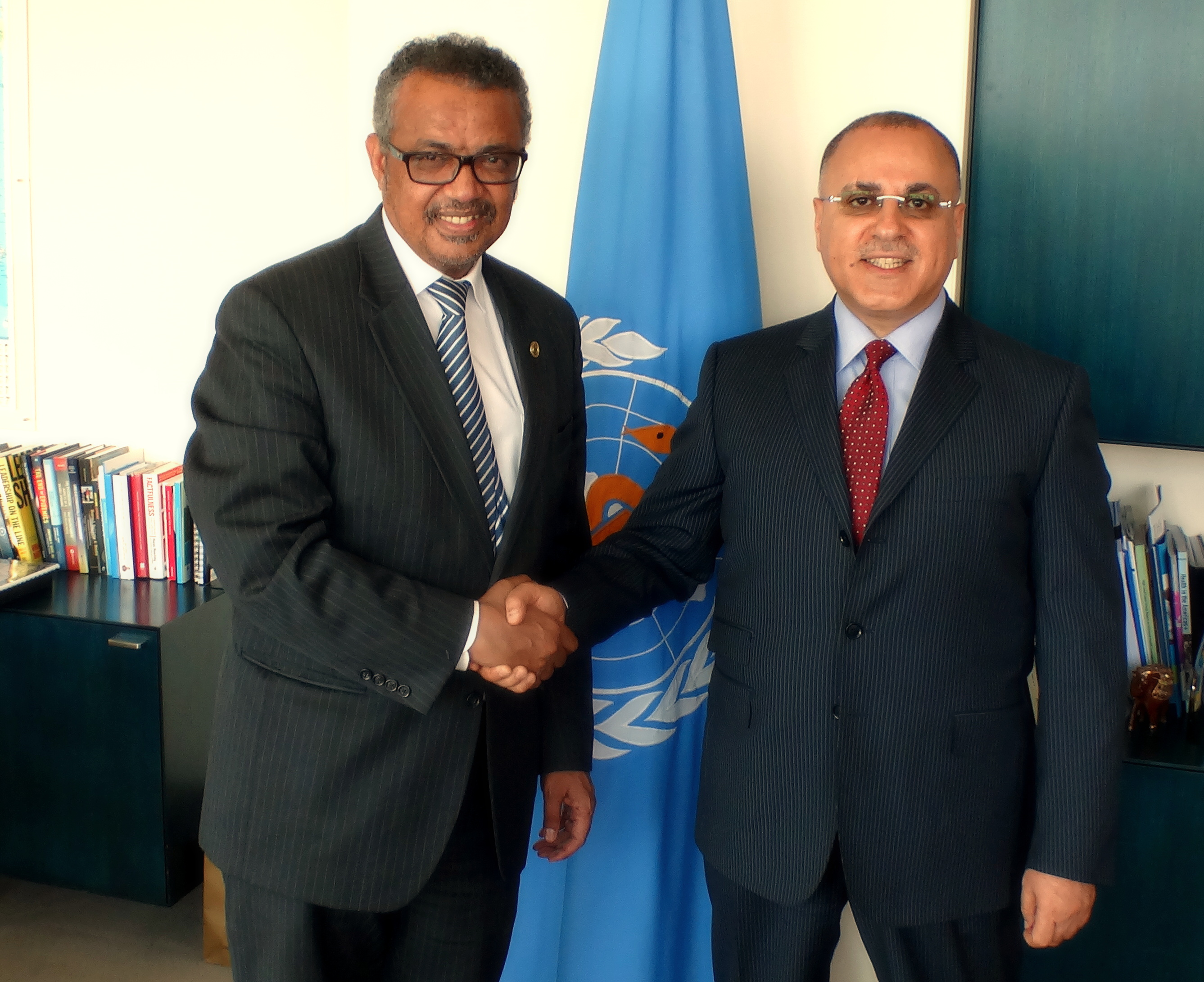 Kuwait's Permanent Representative to the UN and other international organizations in Geneva Ambassador Jamal Al-Ghunaim with Director-General of the World Health Organization (WHO) Dr. Tedros Adhanom Ghebreyesus