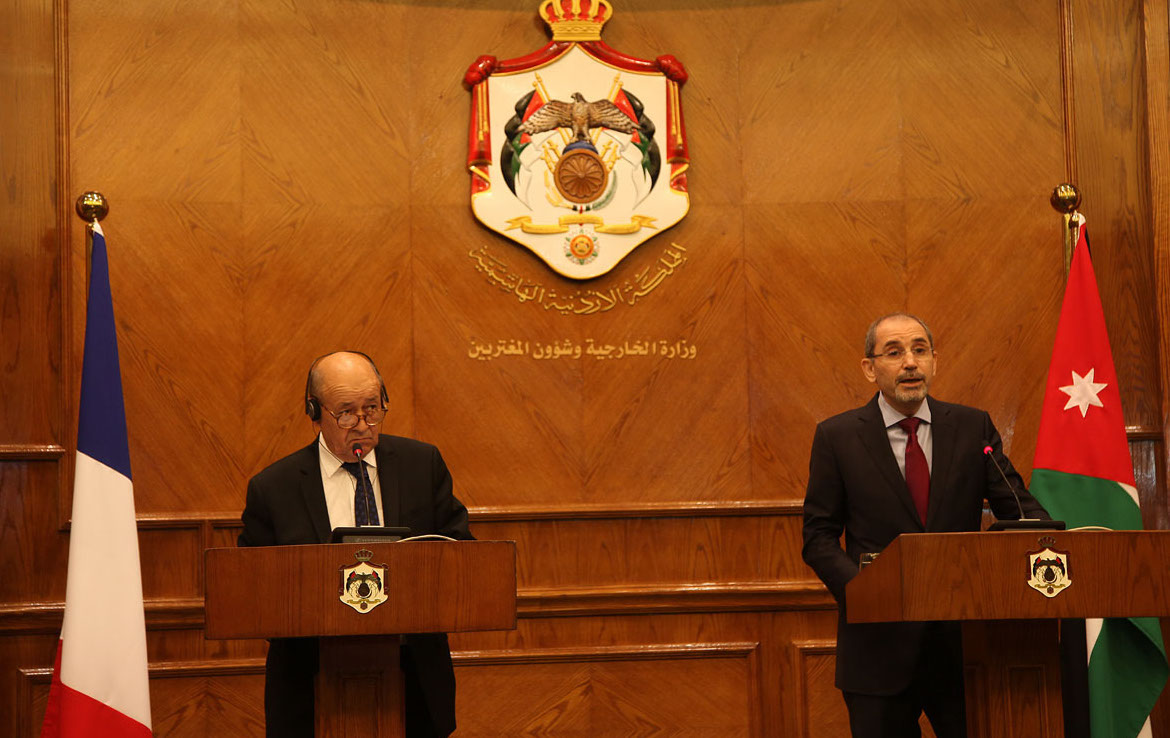 Jordanian Foreign Minister Ayman Safadi with French Minister of Europe and Foreign Affairs Jean-Yves Le Drian