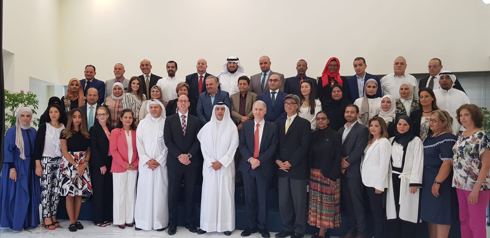 education's undersecretary Haitham Al-Athari with WBG representatives on the sidelines of a course