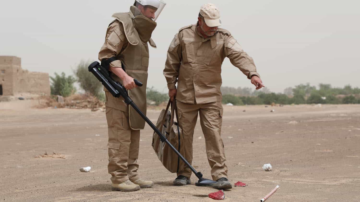 (Masam) team removing mines and unexploded ordnance
