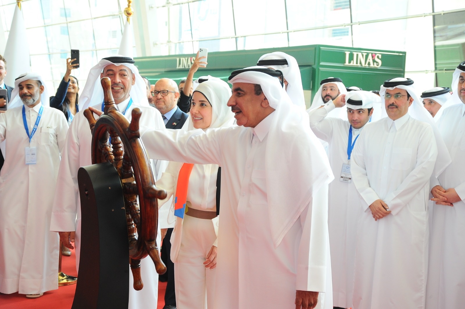 Dr. Janan Ramadan with Qatar's Transport and Communications Minister during the opening of the exhibition