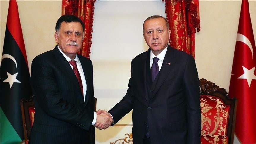 الرئيس التركي مع رئيس الحكومة الليبية فائز السراج