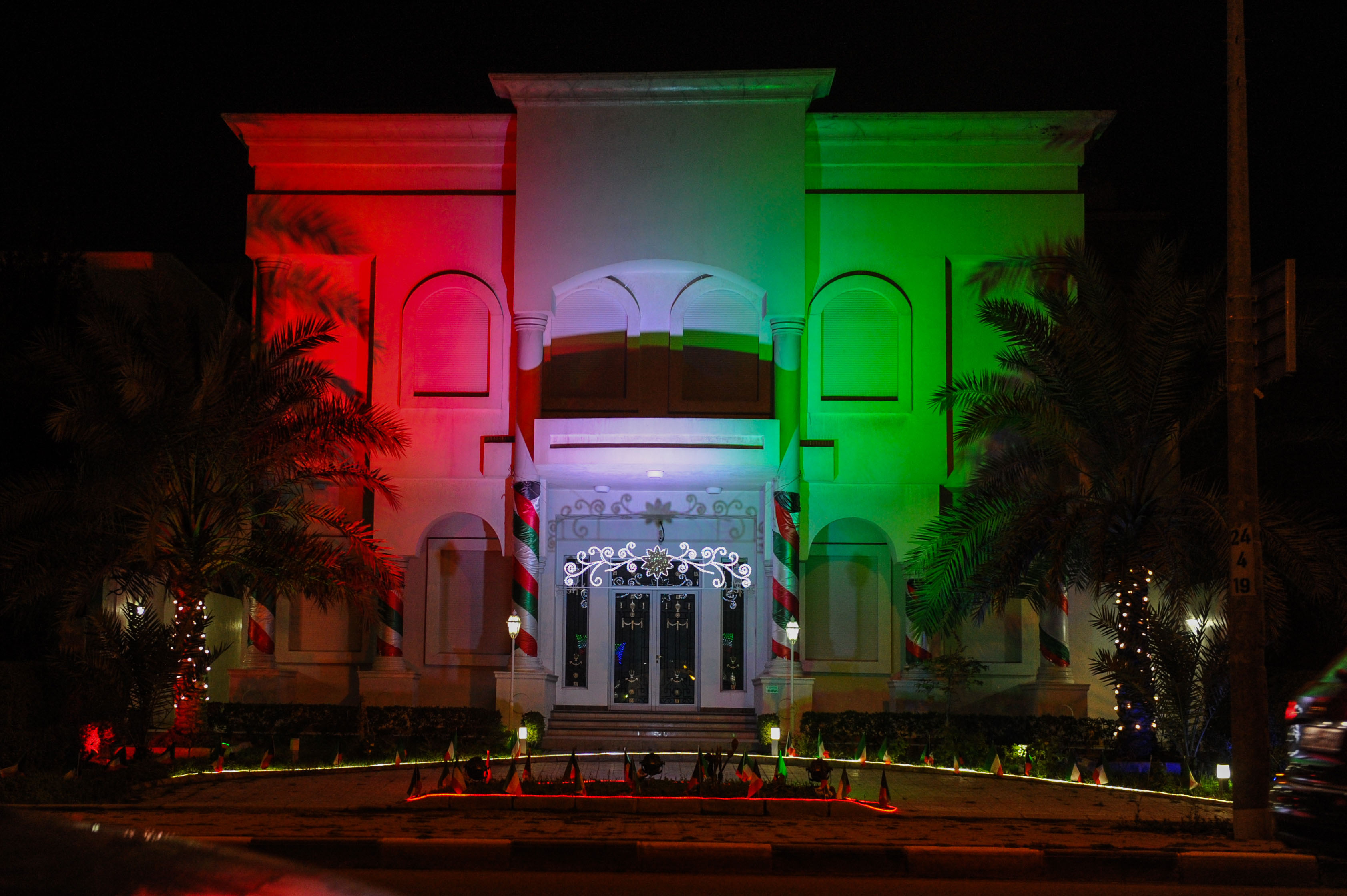 Kuwaiti houses decorated with lights representing the colors of the Kuwaiti flag