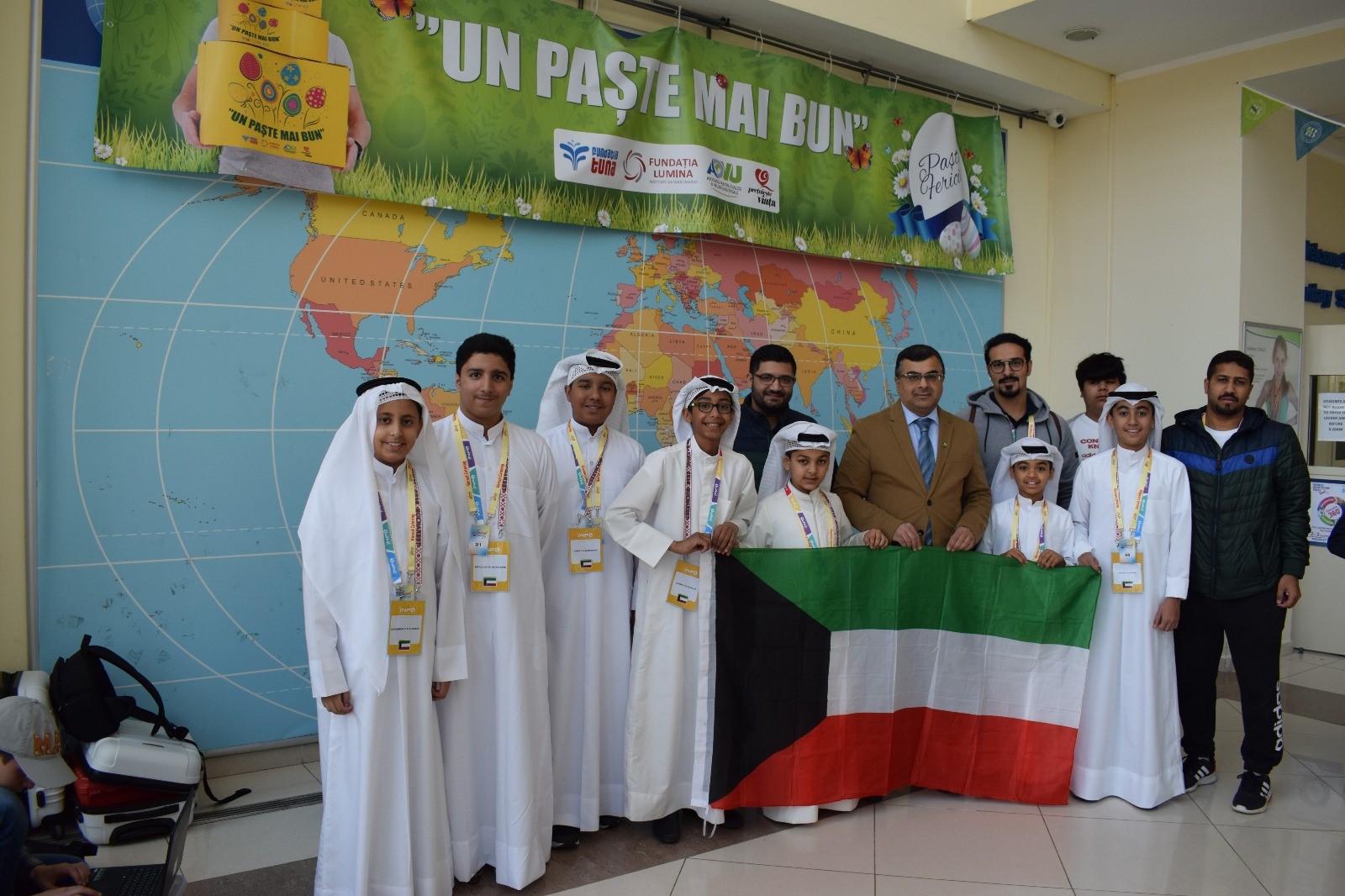 Kuwait's Ambassador to Romania Talal Al-Hajri with Robot team