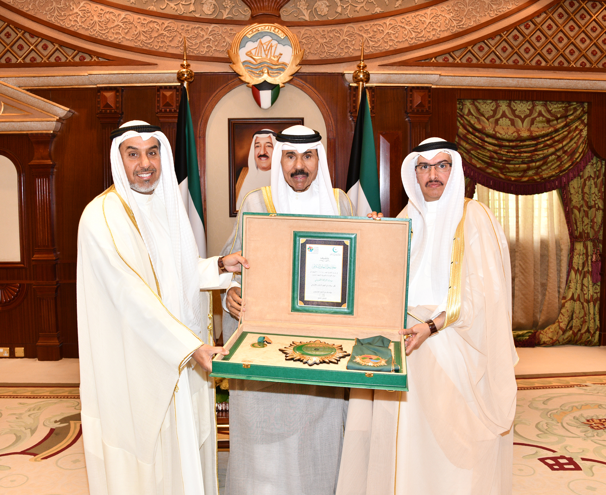 the Crown Prince Sheikh Nawaf Al-Ahmad Al-Jaber Al-Sabah received  Minister of Awqaf and Islamic Affairs Fahad Al-Shula and Chairman of Zakat House Mohammad Al-Otaibi