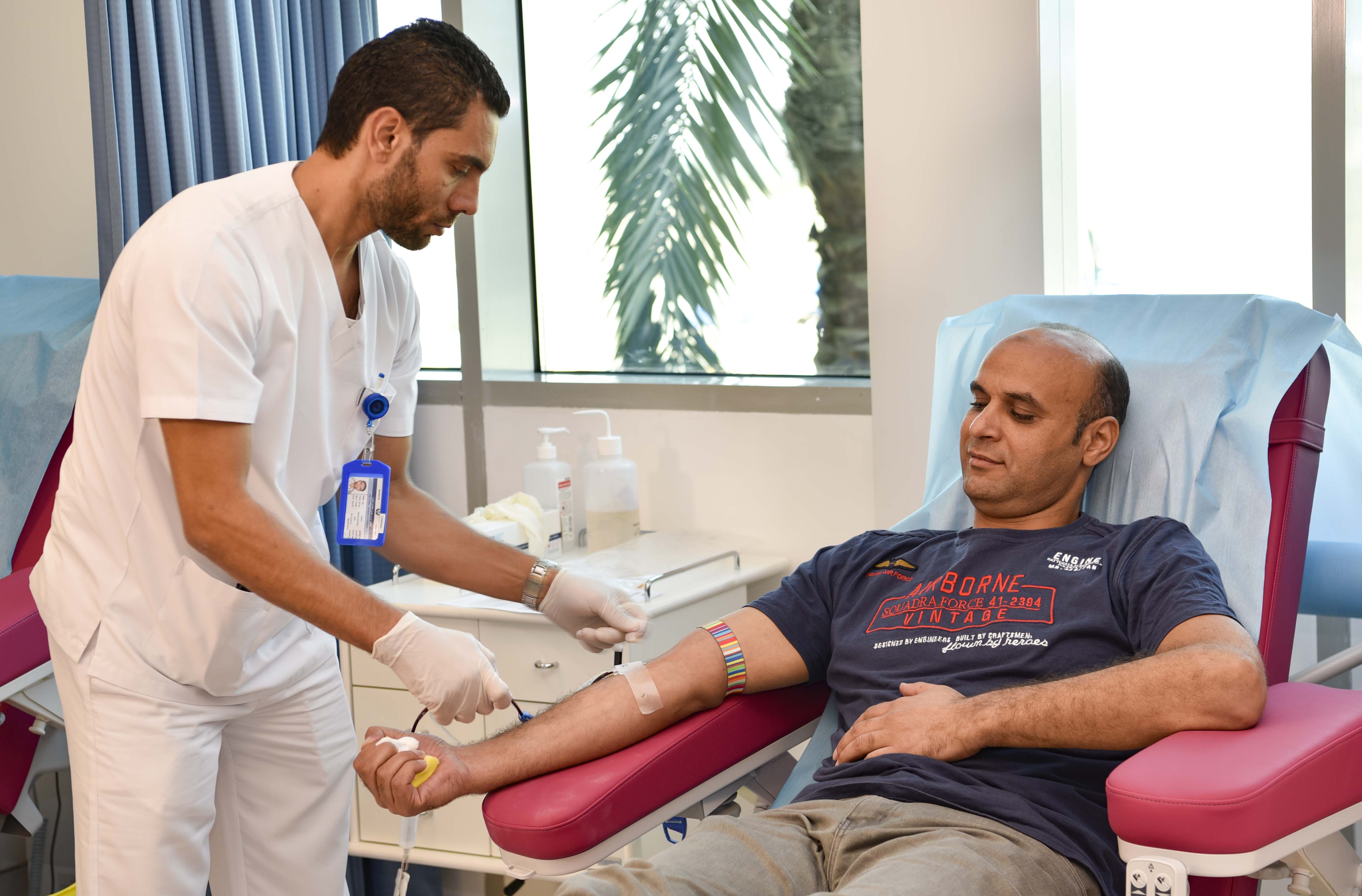 A donor giving blood at the Central Blood Bank