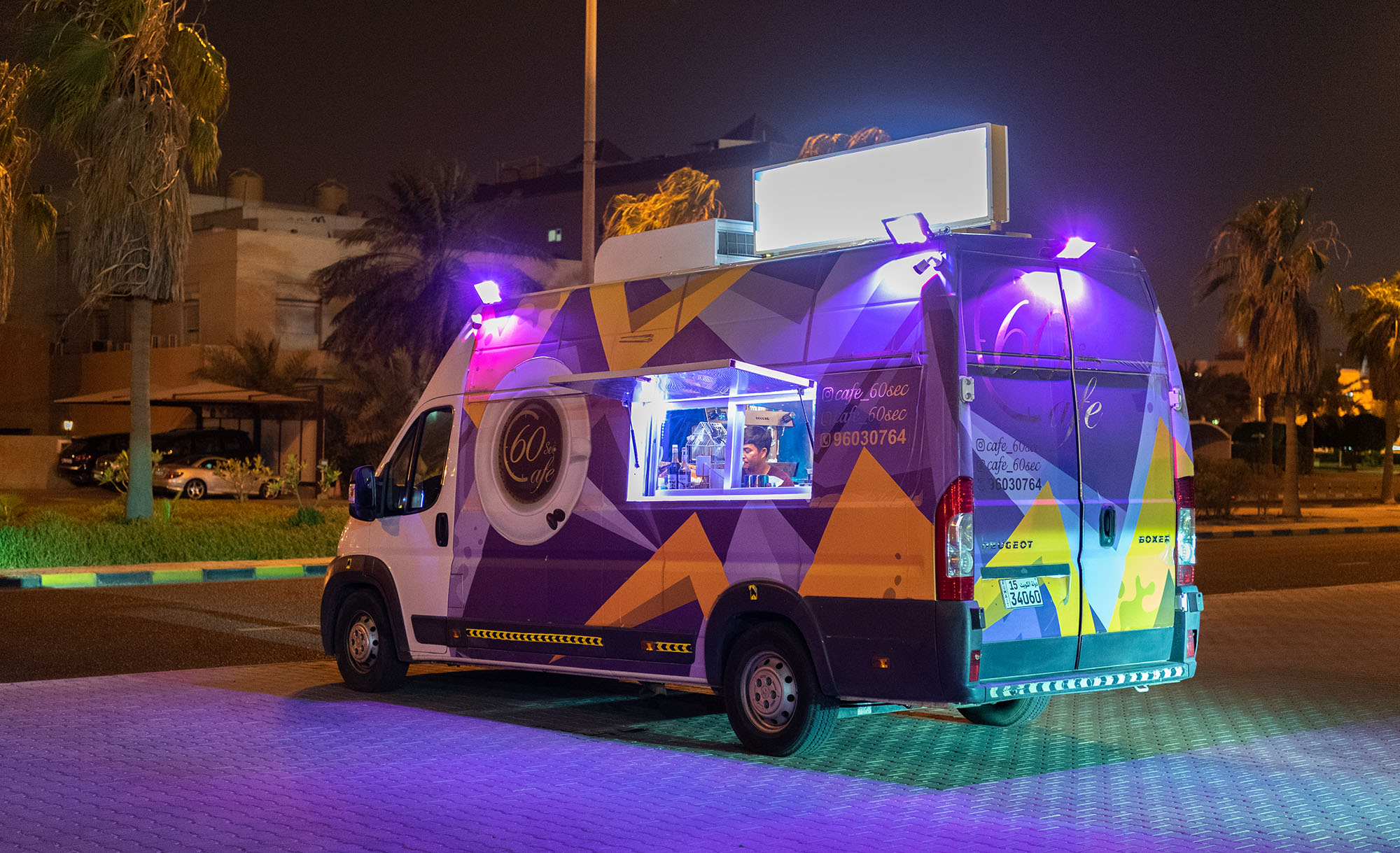 A food car decorated with lights