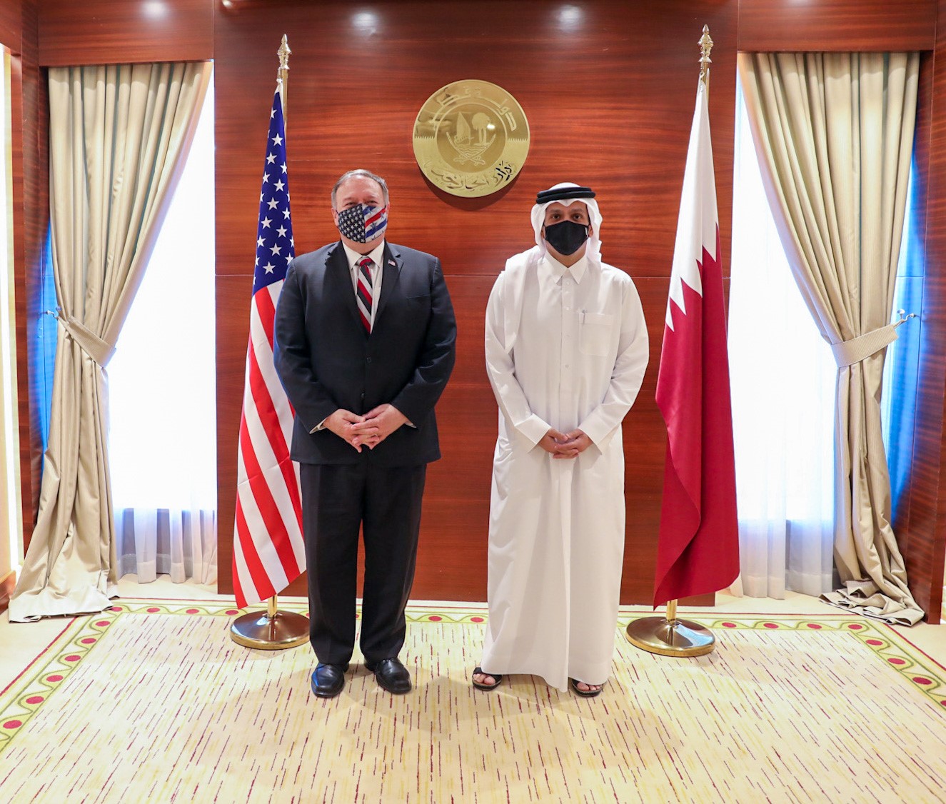 وزير الخارجية القطري خلال استقبال وزير الخارجية الأمريكي