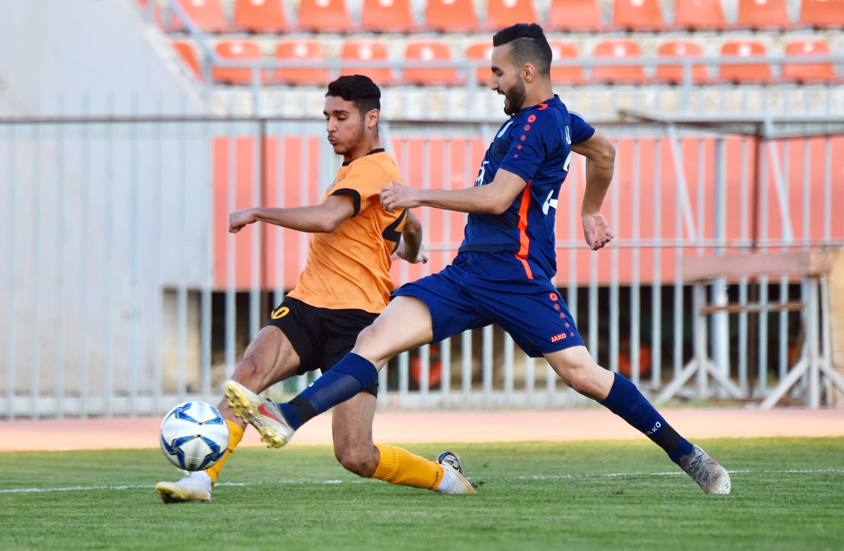 Defender intercepts the striker