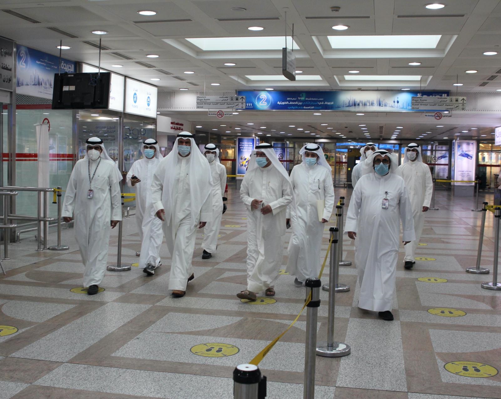 Minister Mubarak Al-Haris with officials in Kuwait Airport