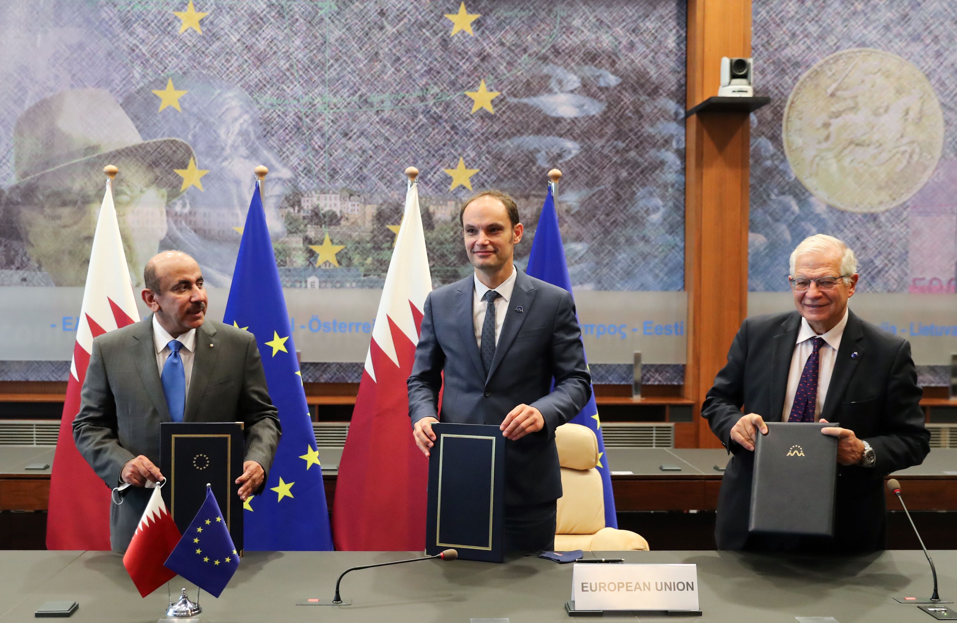 Qatari Minister of Transport ,Slovenian Minister for Foreign Affairs and EU High Representative at the signing ceremony