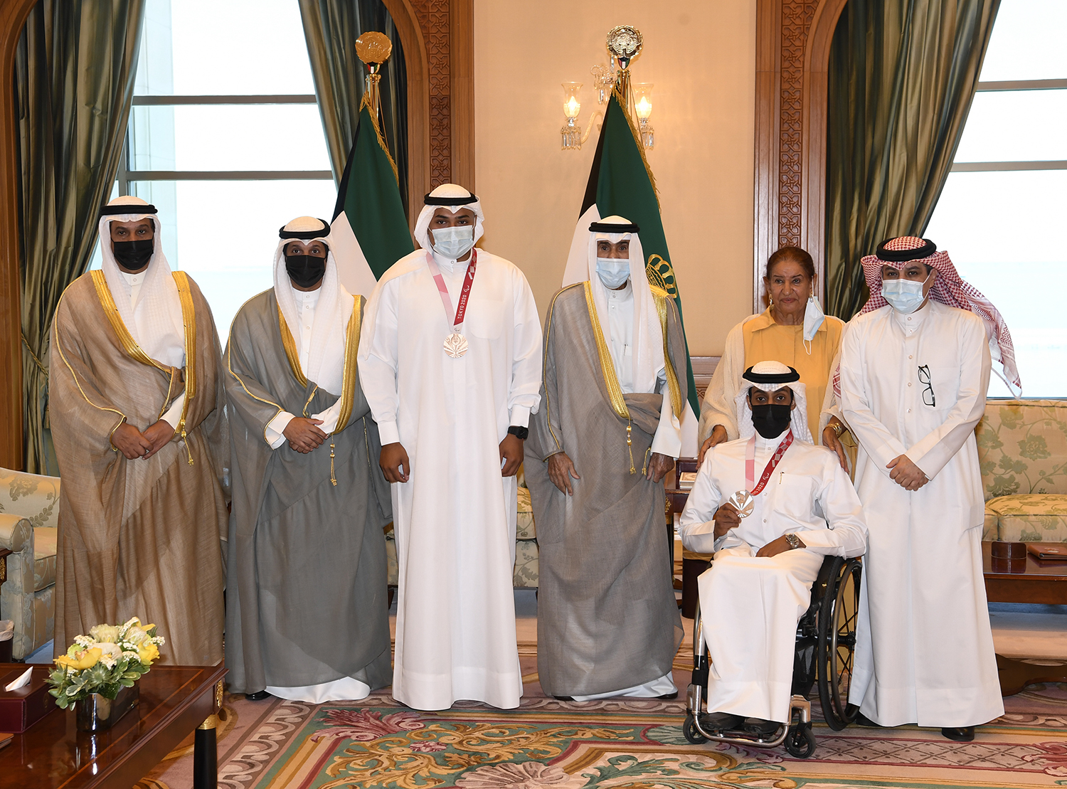 HH the Amir with Information Minister, honorary chairperson of (KDSC), and the winning paralympic athletes	