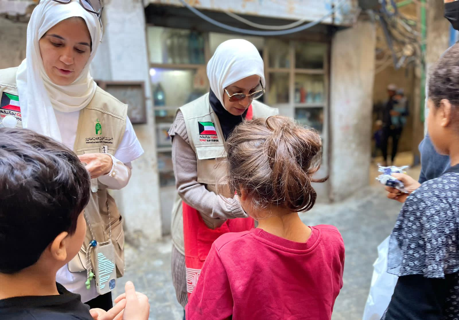 Members of The International Islamic Charity Organization helped needy Lebanese families as part of their winter campaign