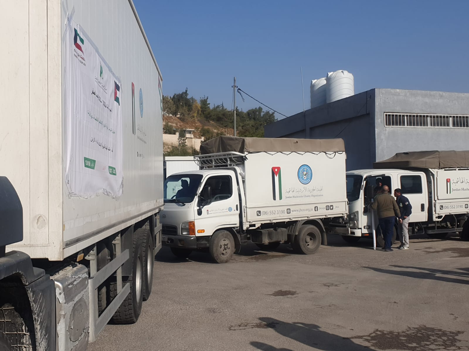 Trucks transport cargo of the "winter bags campaign" to Jordanian provinces
