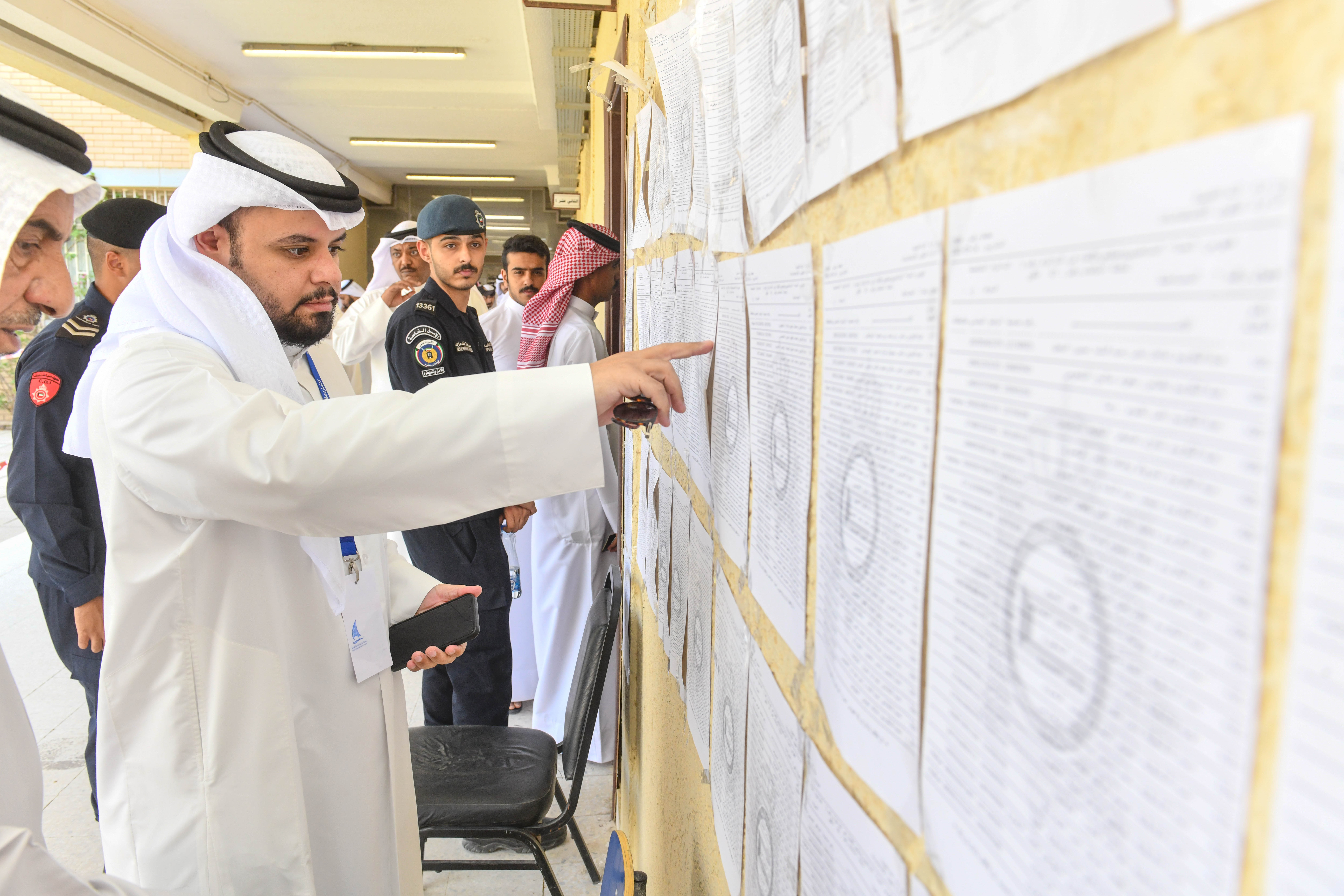 Kuwaiti Society of National  Integrity  supervisor watches the electoral process
