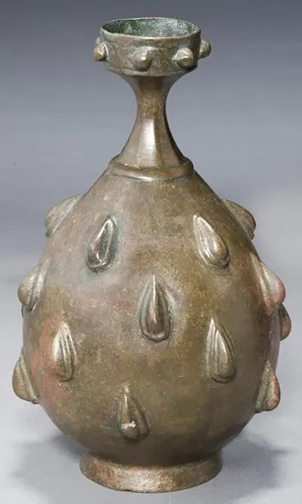 Bronze perfume sprayer decorated with rows of buds from eastern Persia in the 9-10th century