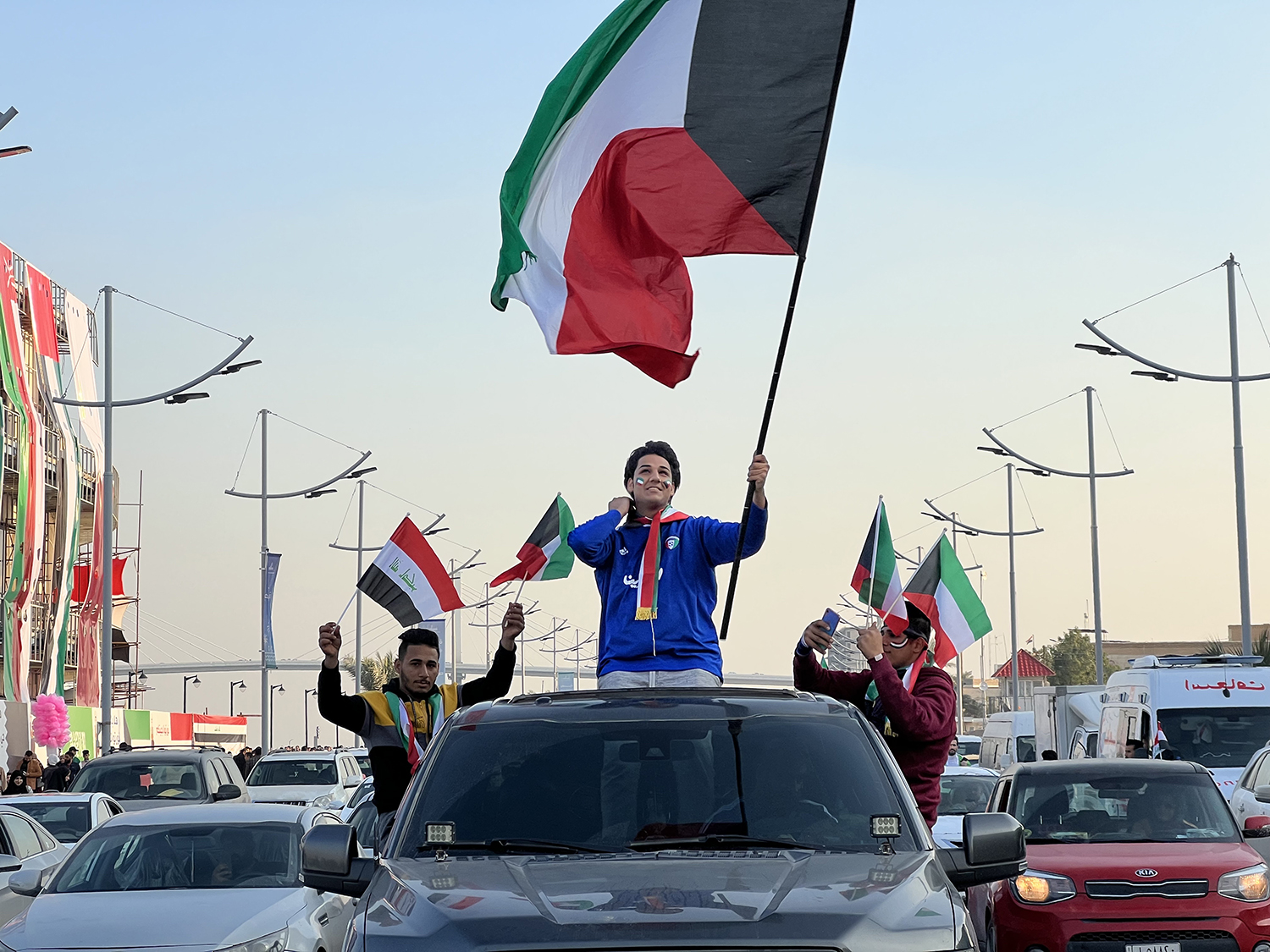 The Kuwaiti fans head to Al-Minaa Olympic Stadium