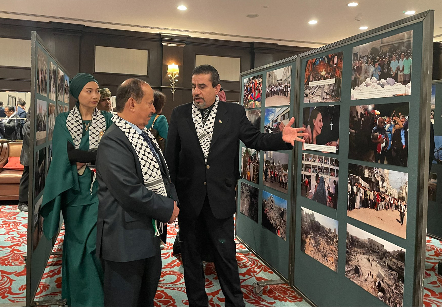 Members of the diplomatic mission displaying Palestinian carnage