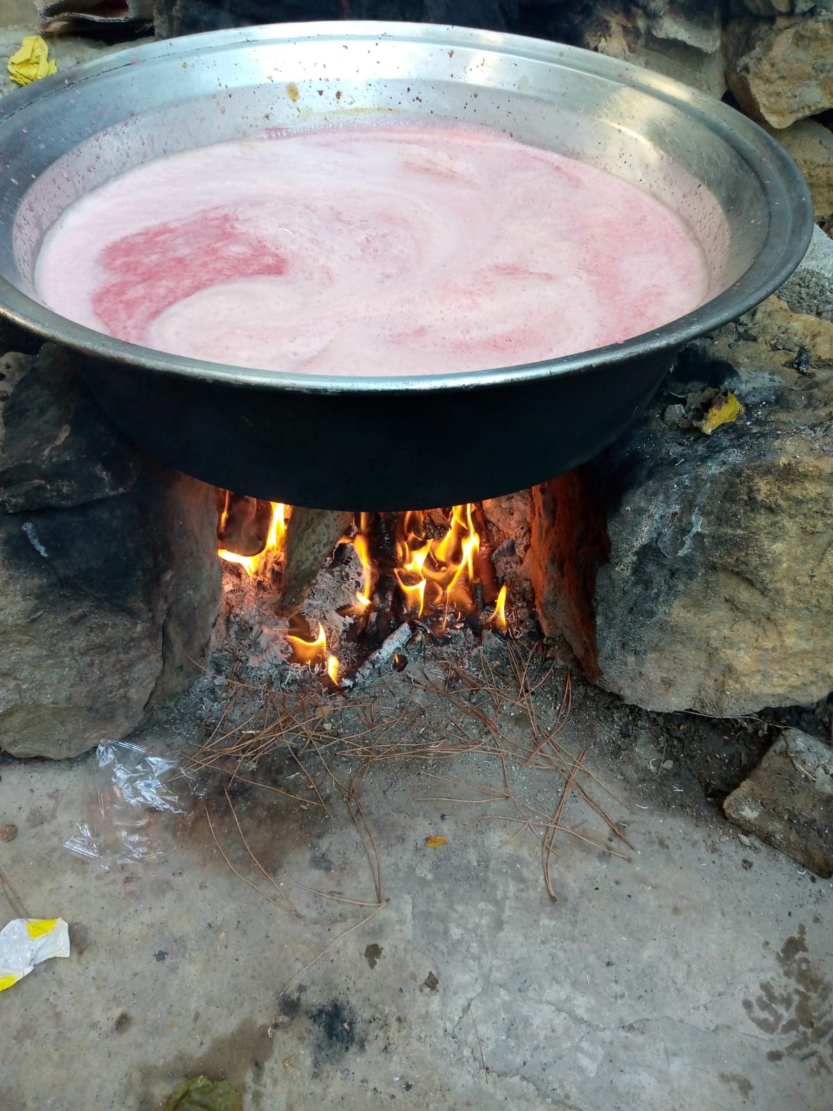 Pomegranate juice is cooked outdoor