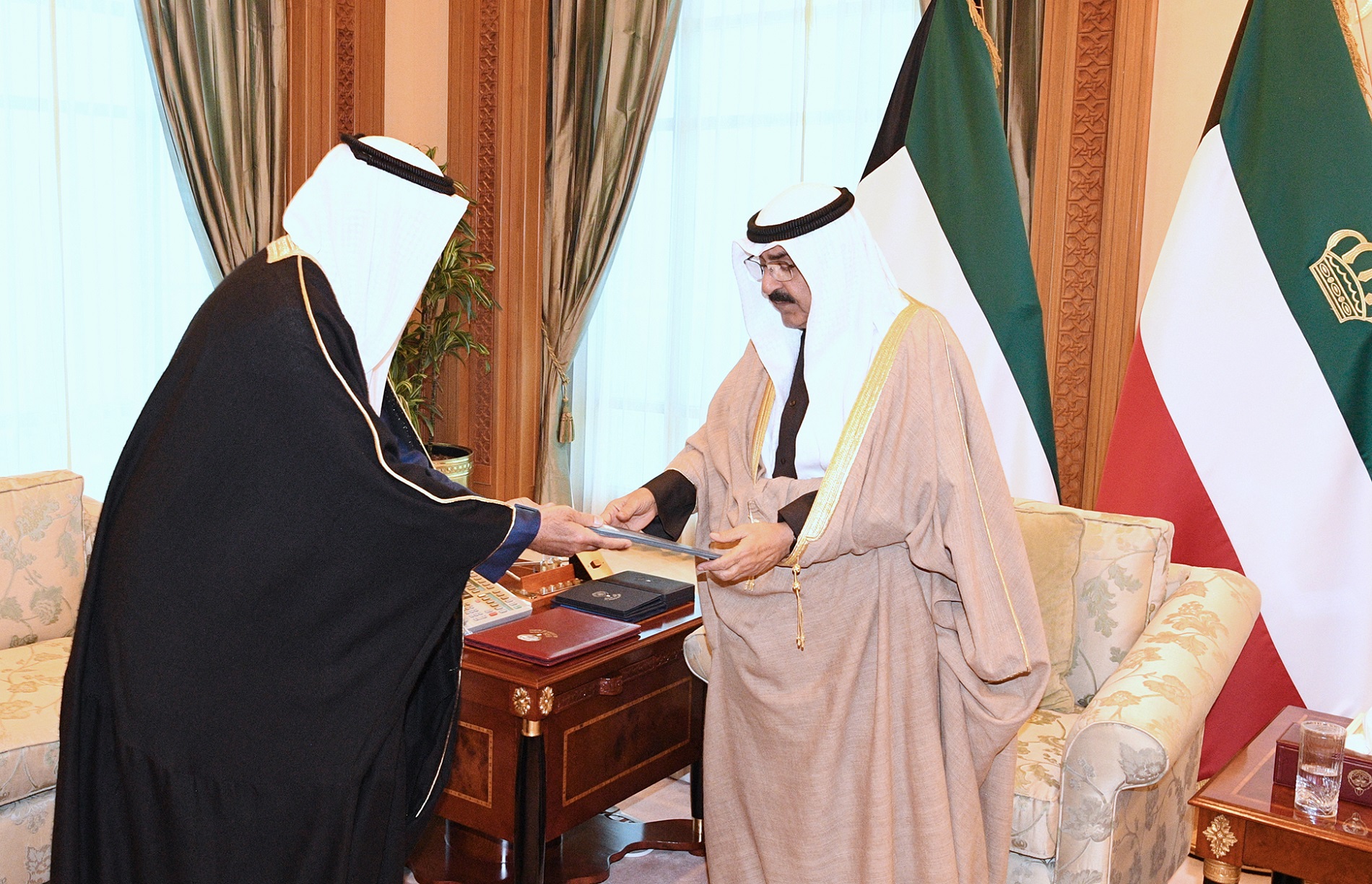 His Highness the Amir Sheikh Mishal Al-Ahmad Al-Jaber Al-Sabah receives His Highness PM who tendered the government resignation