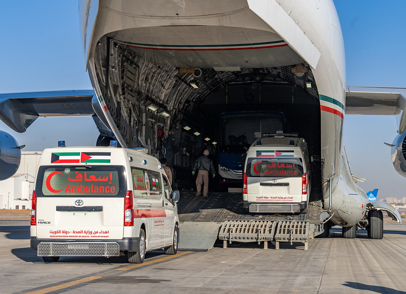 The 34th Kuwait relief plane for the Gaza carrying 40 tons of humanitarian aid that includes two two ambulances and a mobile clinic