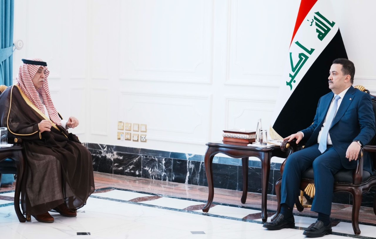 Iraqi Prime Minister Mohammad Al-Sudani and Saudi Trade Minister Majid Al-Qasabi