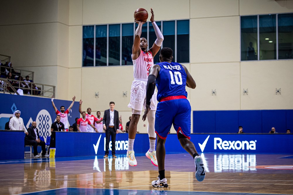 Kuwait SC Basketballer aiming for the hoop.