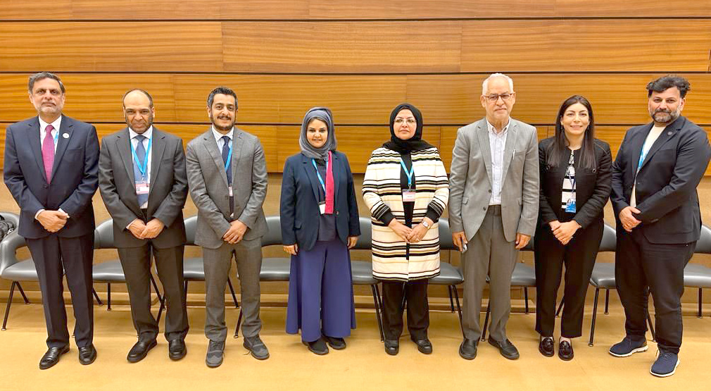 Dr. Buthaina Al-Mudhaf and a number of participants.